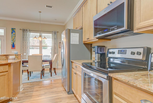 kitchen featuring pendant lighting, crown molding, visible vents, appliances with stainless steel finishes, and light brown cabinets