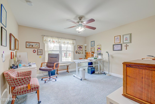 office space with ceiling fan, carpet flooring, and baseboards