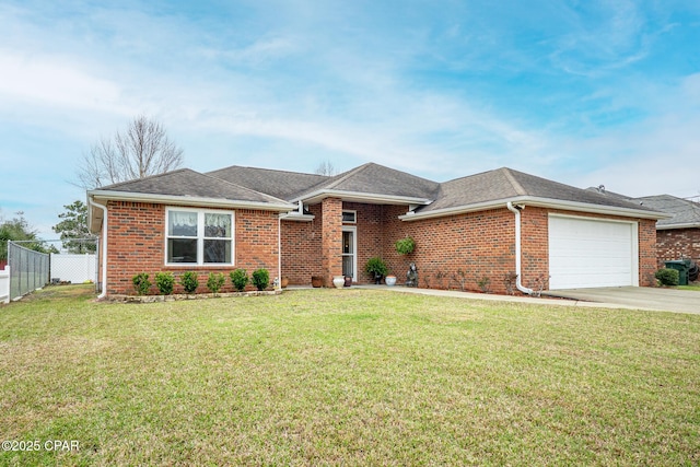 view of front of property with an attached garage, fence, a front lawn, and brick siding