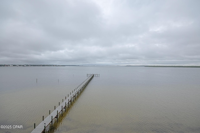 view of dock with a water view