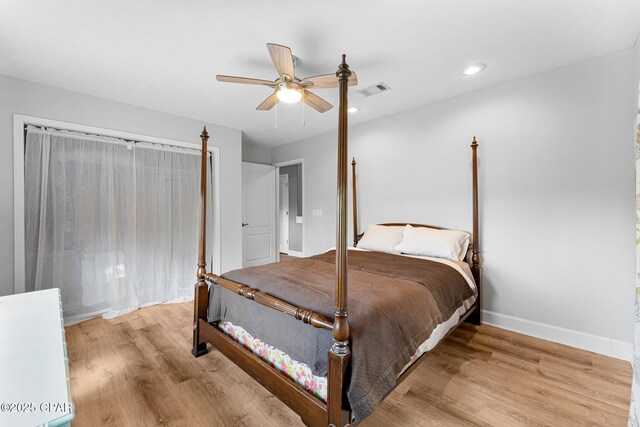 bedroom featuring recessed lighting, visible vents, ceiling fan, wood finished floors, and baseboards