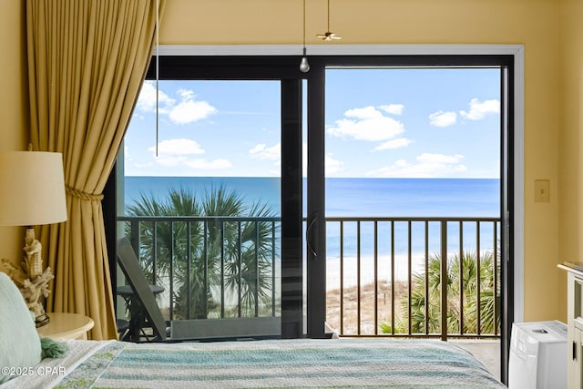 unfurnished bedroom with a beach view and a water view