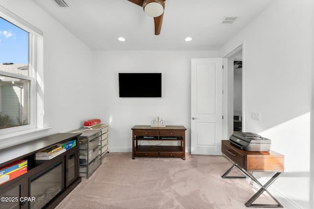 sitting room with a ceiling fan, visible vents, baseboards, carpet, and recessed lighting