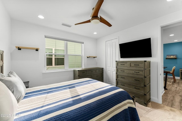 bedroom with baseboards, a ceiling fan, recessed lighting, and visible vents
