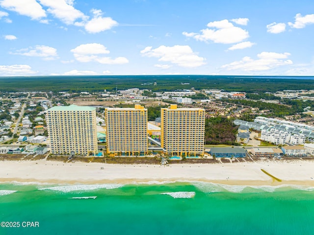 drone / aerial view with a view of city, a beach view, and a water view