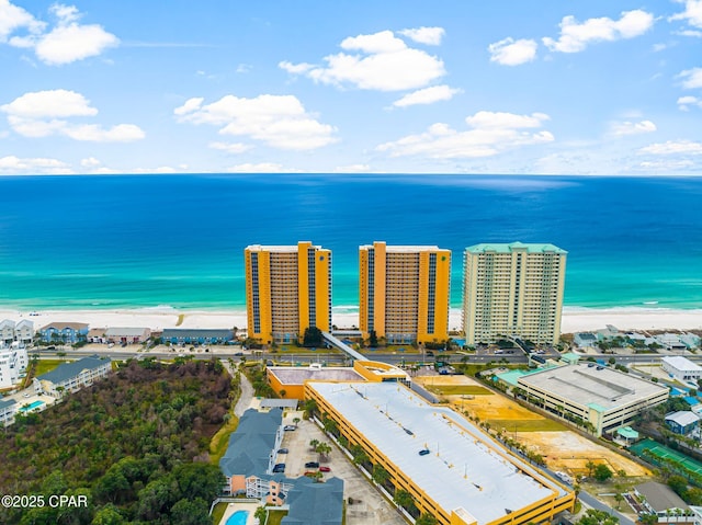 bird's eye view featuring a beach view and a water view