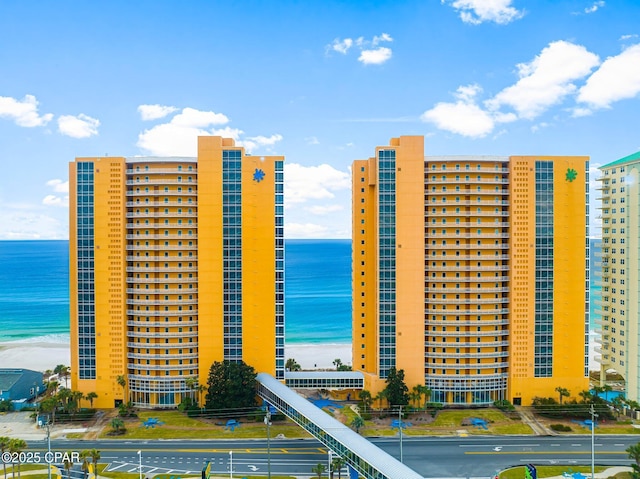 view of building exterior with a water view