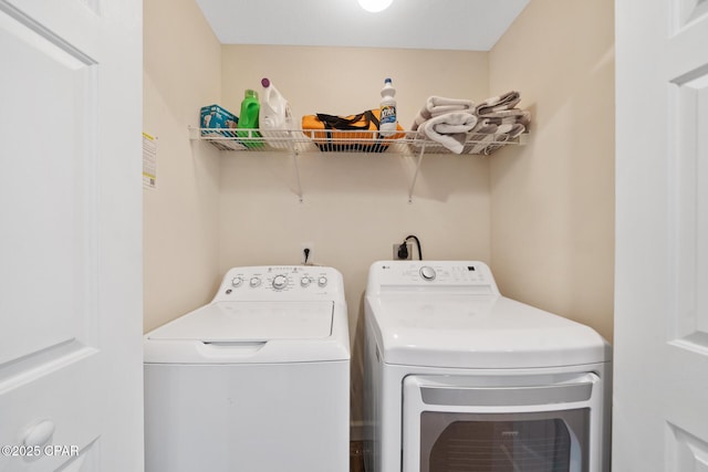 washroom with laundry area and washer and clothes dryer