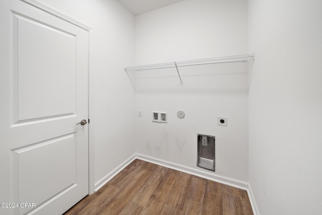 laundry area featuring washer hookup, electric dryer hookup, wood finished floors, laundry area, and baseboards