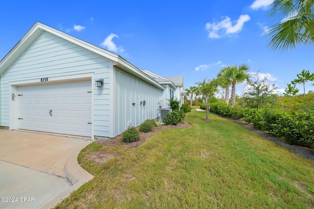 view of home's exterior with a yard