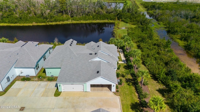 drone / aerial view with a water view