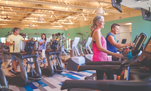 exercise room featuring visible vents