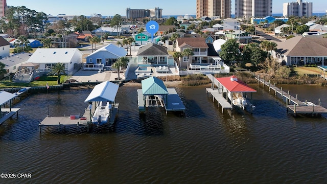 dock area with a water view and a residential view