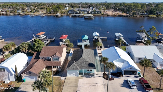 aerial view with a residential view and a water view