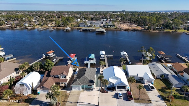 bird's eye view with a residential view and a water view