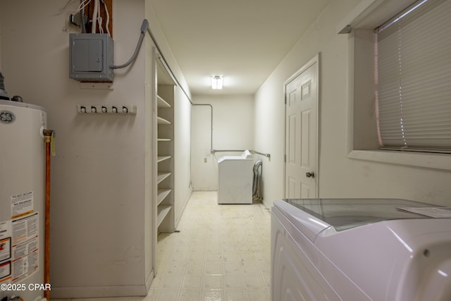 laundry area featuring gas water heater, light floors, separate washer and dryer, laundry area, and electric panel