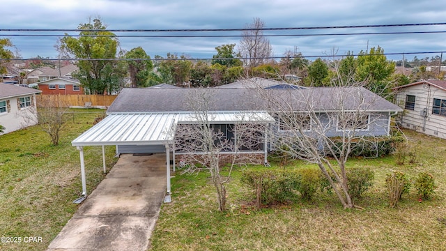 view of front of property with a front yard and metal roof