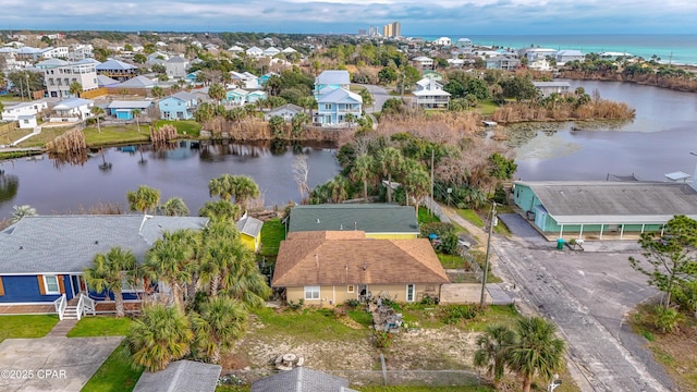 bird's eye view featuring a residential view and a water view