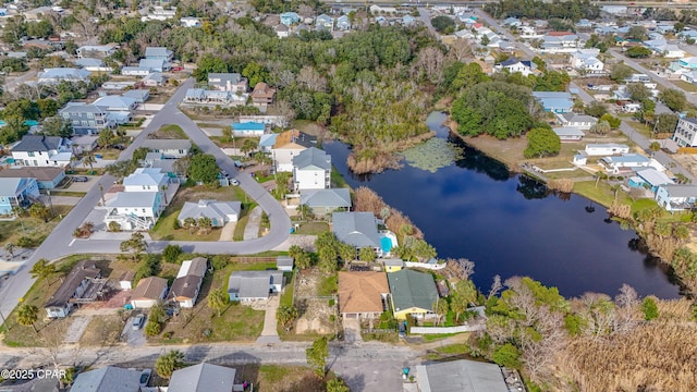 bird's eye view with a residential view and a water view