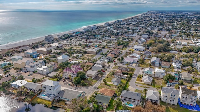 bird's eye view featuring a water view, a residential view, and a beach view