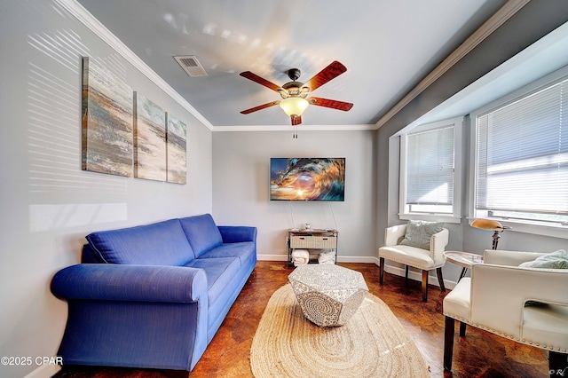 living room with visible vents, crown molding, baseboards, and ceiling fan