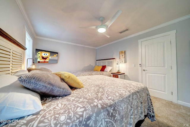 bedroom with carpet floors, visible vents, ornamental molding, and ceiling fan