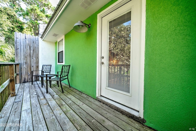 wooden terrace with visible vents