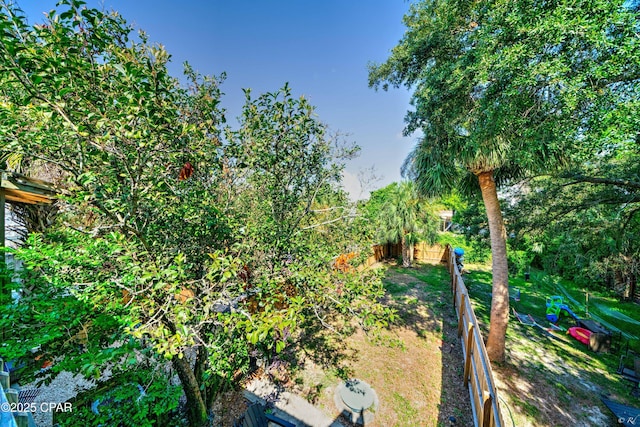 view of yard featuring fence