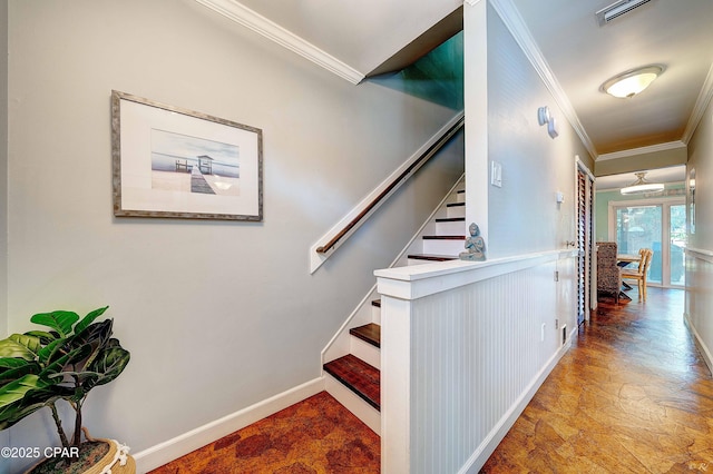 staircase featuring ornamental molding, stone finish flooring, visible vents, and baseboards