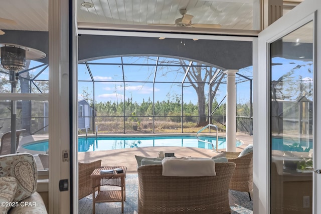 outdoor pool with a ceiling fan