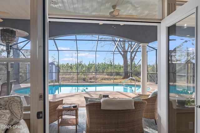 233 Moonlight Bay Dr, Panama City Beach, FL 32407 - pool featuring glass enclosure, a patio, and a ceiling fan