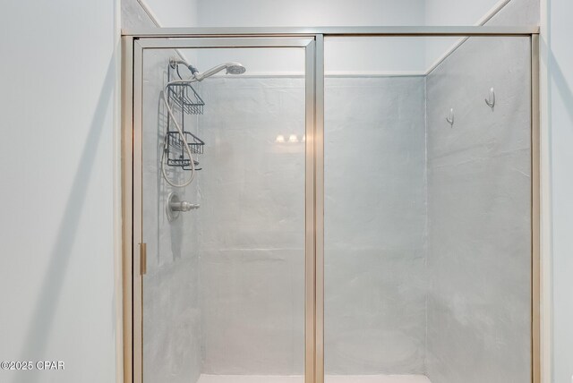 bathroom with a stall shower