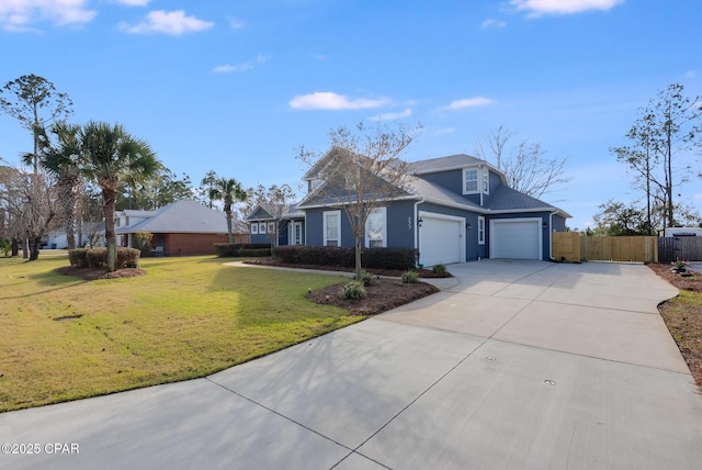 233 Moonlight Bay Dr, Panama City Beach, FL 32407 - traditional-style house featuring stucco siding, fence, a front lawn, an attached garage, and concrete driveway