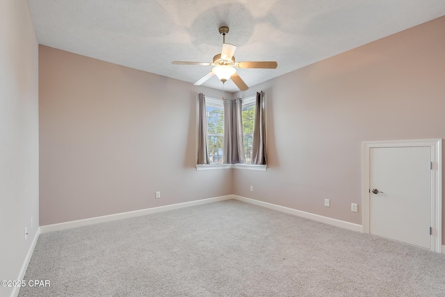 233 Moonlight Bay Dr, Panama City Beach, FL 32407 - carpeted spare room with baseboards and ceiling fan
