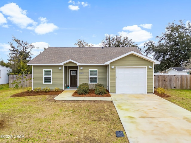 ranch-style home featuring an attached garage, fence, and a front yard