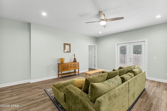 living room featuring recessed lighting, wood finished floors, a ceiling fan, baseboards, and french doors