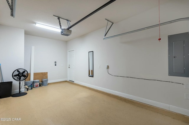 garage with electric panel, baseboards, and a garage door opener