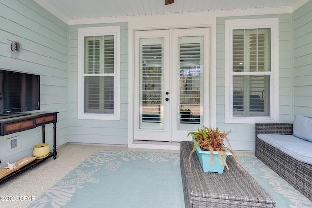 entrance to property with an outdoor living space