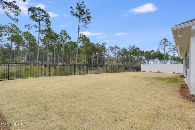 view of yard with fence