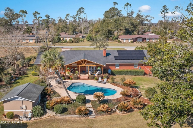 3368 Bevia Rd, Marianna, FL 32446 - swimming pool with a lawn and a patio area