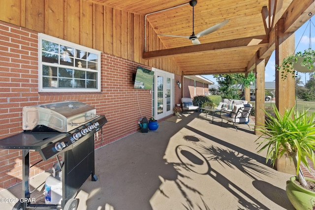 view of patio with outdoor lounge area, grilling area, and french doors