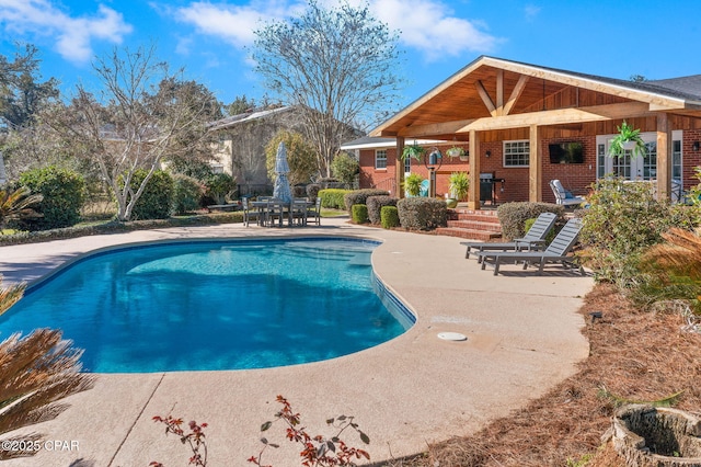 pool featuring a patio area