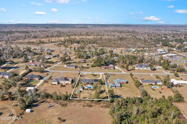 3368 Bevia Rd, Marianna, FL 32446 - aerial view of property and surrounding area with property parcel outlined and nearby suburban area