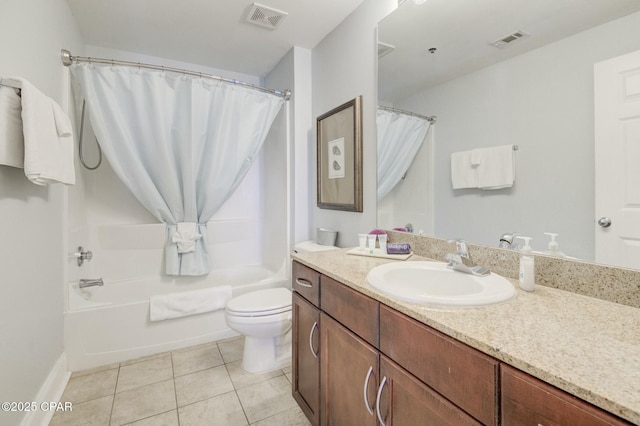 bathroom with vanity, tile patterned flooring, toilet, and visible vents