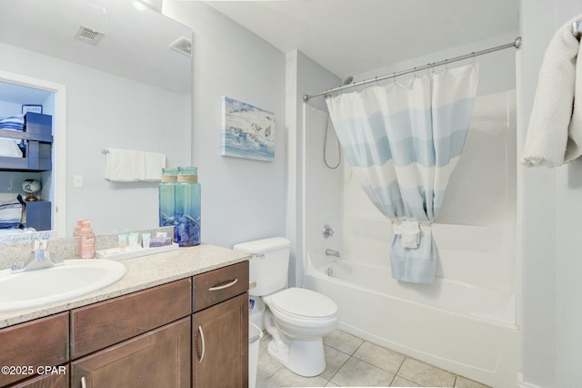 full bath featuring visible vents, vanity, tile patterned floors, toilet, and shower / tub combo with curtain