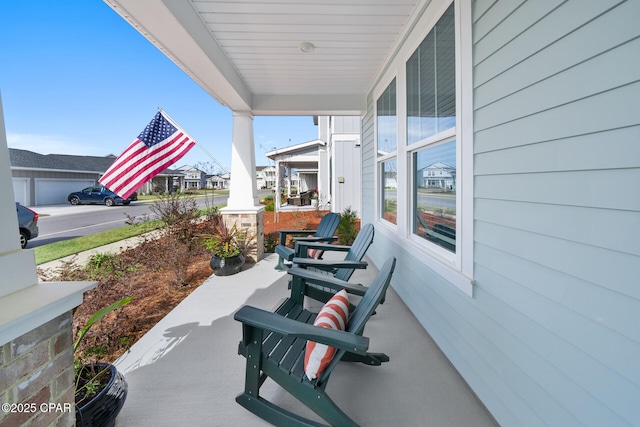 view of patio featuring a porch