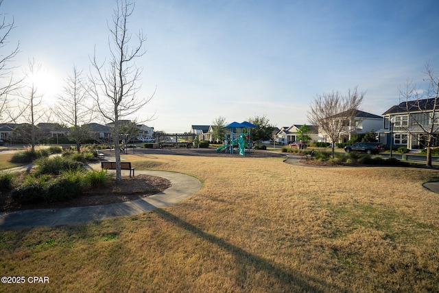 view of yard with a residential view and playground community