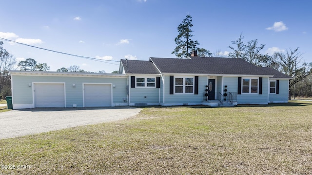 ranch-style home featuring roof with shingles, a chimney, an attached garage, driveway, and a front lawn