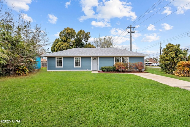 single story home with a front yard