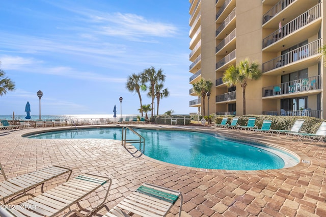 pool with a patio